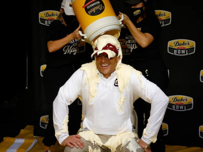 South Carolina’s Shane Beamer gets his mayonnaise bath after Gamecocks win Duke’s Mayo Bowl